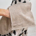 Load image into Gallery viewer, Dog drying towel with hand grips for thorough cleaning
